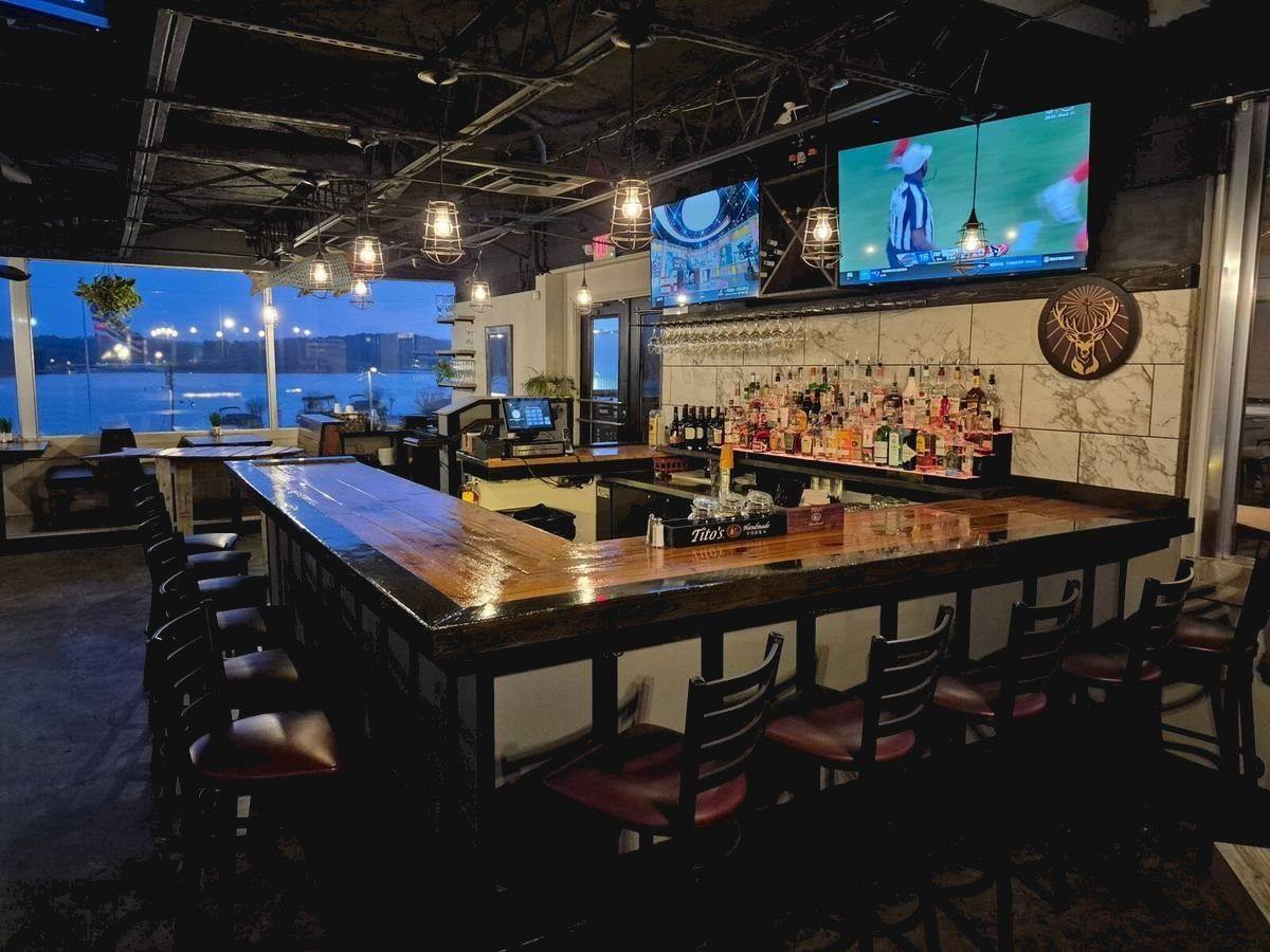 The bar at night with lake views