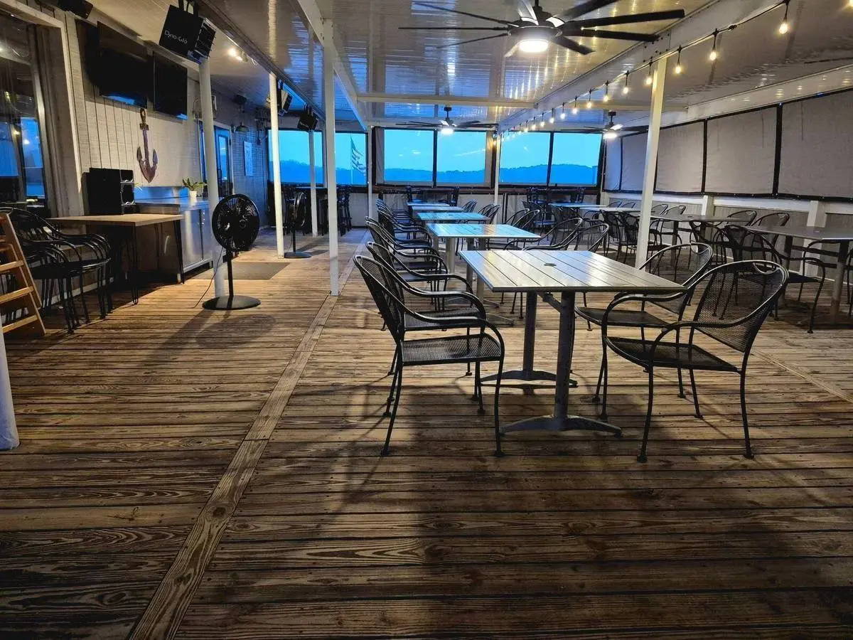 Outdoor deck at dusk with string lights